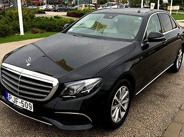 Mercedes E class. VIP tourism in Hungary. Transportation services. VIP Transfers and rental of luxury cars with a driver, premium limousine service. 