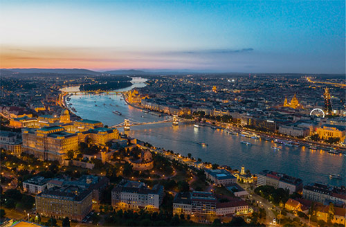 Budapest Aircruise sightseeing flights at sunset. Book a Aircruise - Flight above Budapest at night. 