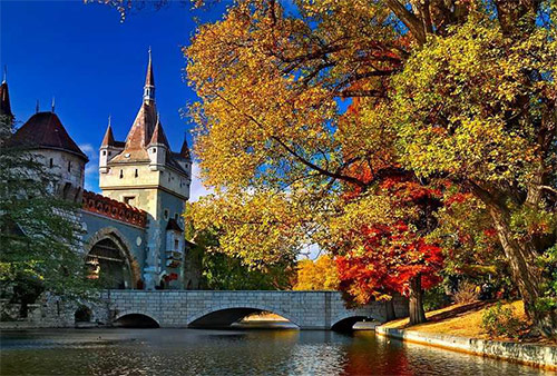 Vajdahunyad Castle is one of the romantic castles in Budapest, Hungary, located in the City Park by the boating lake / skating rink